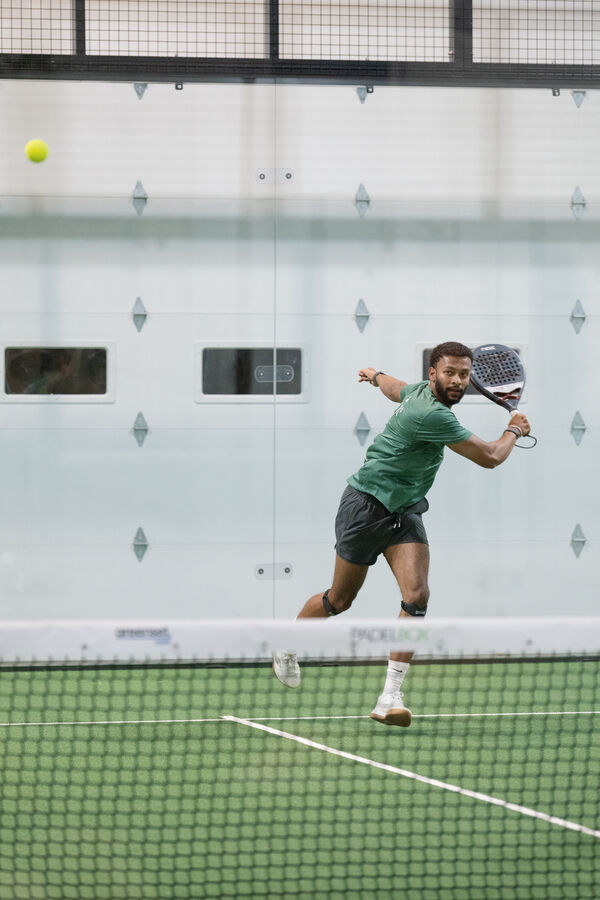 Athletic smash at Access Padel