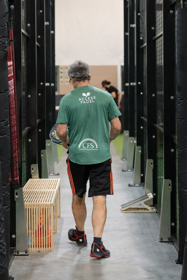 Player walking between courts