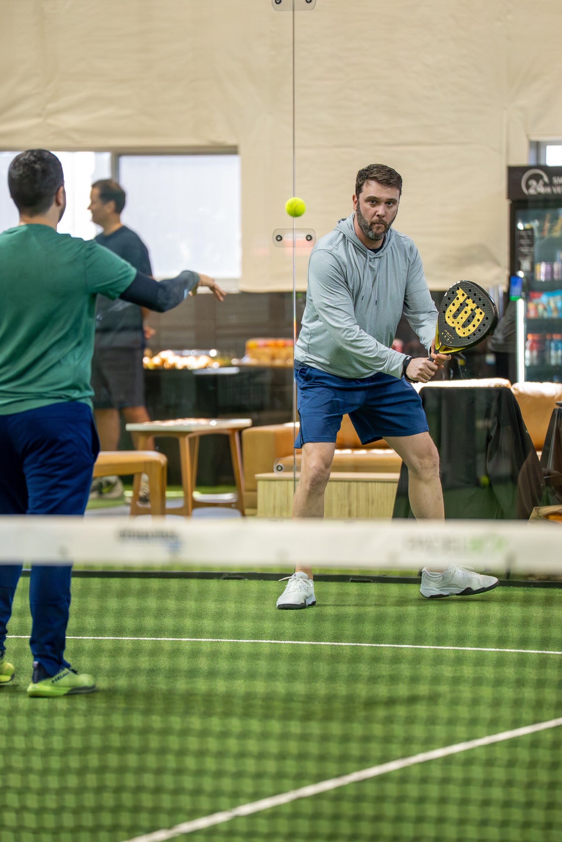 Padel match rally at Access Padel