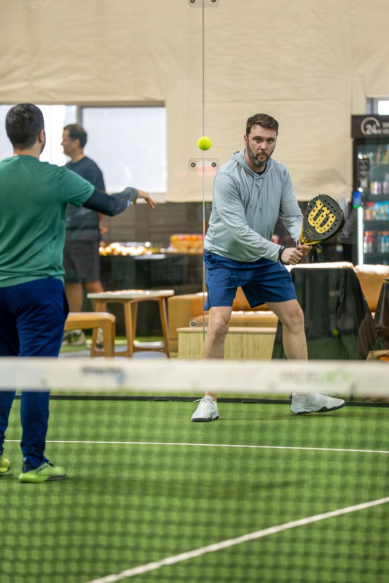 Open play match action at Access Padel